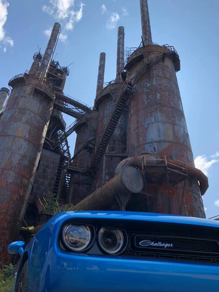 Challenger framed below the SteelStacks blast furnaces